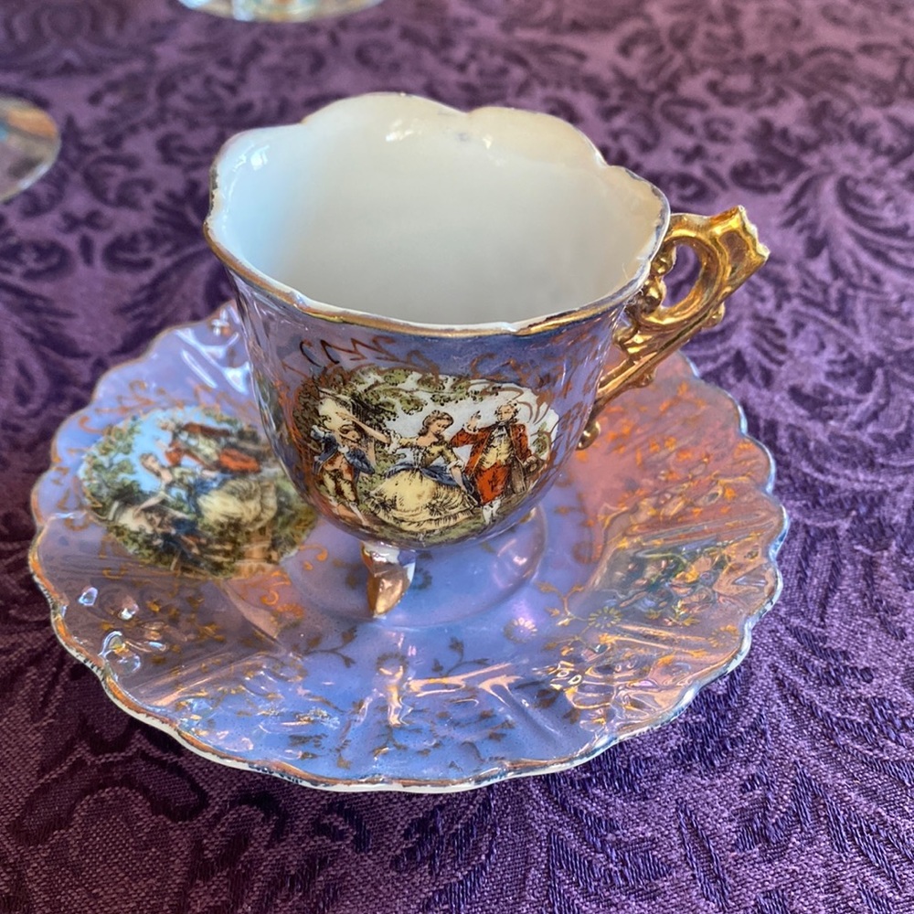 Vintage Handpainted Betson demitasse cup and saucer.